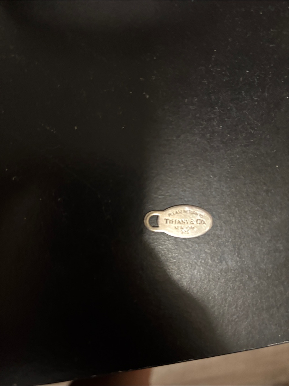 Vintage Tiffany and  Co. oval charm in Sterling Silver